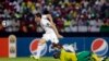 FILE: Algeria's Ishak Belfodil, left, is challenged by South Africa's Anele Ngcongca. Taken Mon., Jan. 19, 2015.