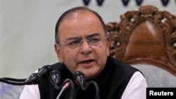 FILE - India's Finance and Defense Minister Arun Jaitley speaks during a news conference in Srinagar, India, June 2014.