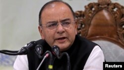 FILE - India's Finance and Defense Minister Arun Jaitley speaks during a news conference in Srinagar, India, June 2014.