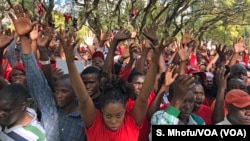 Members of the Movement for Democratic Change Alliance (MDC) rally after the address by their leader Nelson Chamisarally, in Harare, Zimbabwe, July 11, 2018.