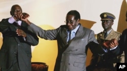 Morgan Tsvangirai e Robert Mugabe