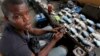 For 10 Cents a Pop, Nigerians Charge Phones at Shop