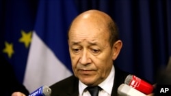 Franch Defense Minister Jean-Yves Le Drian speaks after a press conference, in Paris, January 12, 2013.