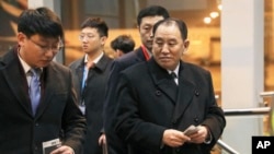 FILE - North Korean official Kim Yong Chol, right, prepares to leave the Beijing International Airport in Beijing, Jan. 17, 2019.