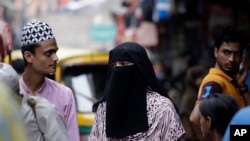 အိန္ဒိယနိုင်ငံ နယူးဒေလီမြို့က မူဆလင်အမျိုးသမီးတဦး။