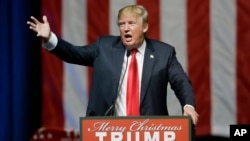 Bakal Capres Partai Republik, Donald Trump dalam kampanye di kota Grand Rapids, Michigan (21/12).