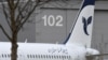 An Airbus A321 with the description "The Airline of the Islamic Republic of Iran" below the tail fin is parked at the Airbus facility in Hamburg Finkenwerder, Germany, Dec. 19, 2016. 