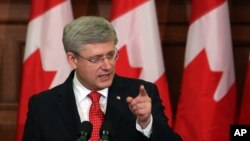 Perdana Menteri Kanada Stephen Harper berpidato di parlemen di Ottawa.