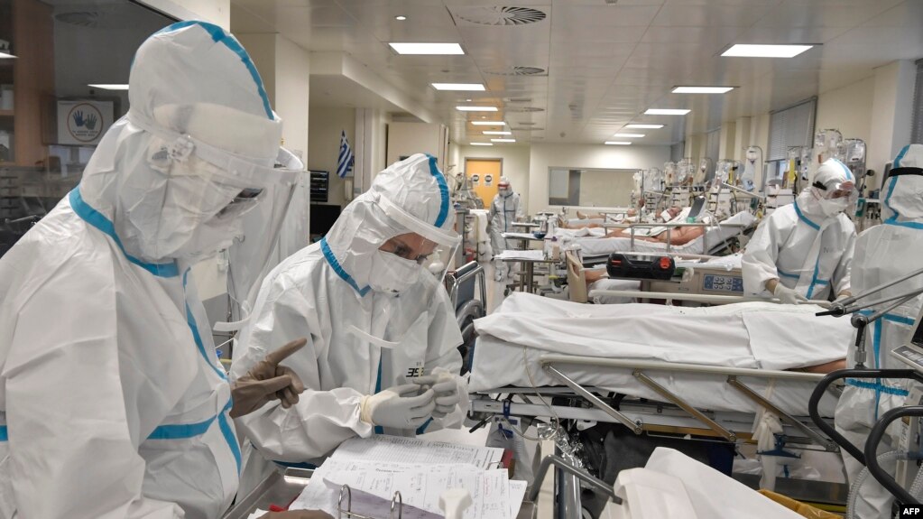Nurses attend Covid-19 patients at the intensive care unit of a hospital in Athens on November 20, 2020.