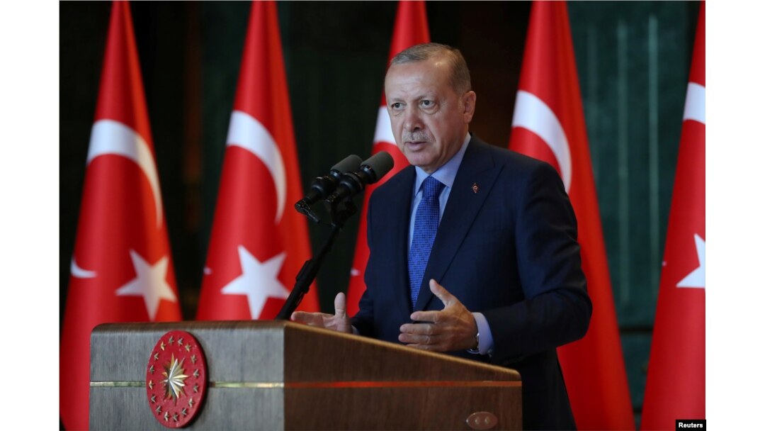 Turkey's President Tayyip Erdogan addresses Turkish Ambassadors during a meeting in Ankara, Turkey, Aug. 13, 2018.
