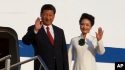 Presiden China Xi Jinping dan istrinya Peng Liyuan (5/10).