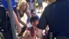 A person is treated by first responders after a deadly stabbing attack on University of Texas campus in Austin, Texas, May 1, 2017. 