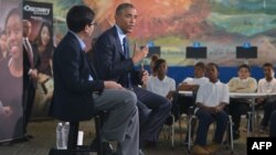 U.S. President Barack Obama speaks during a live “virtual field trip” with students from around the country at the Anacostia Library, April 30, 2015, in Washington, D.C. 