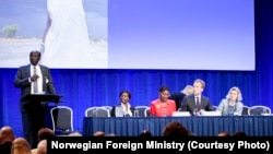 South Sudanese Foreign Minister Barnaba Marial Benjamin addresses a donor conference for South Sudan in Oslo, Norway, in May 2014.