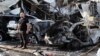 Baghdad Car Bombs Kill at Least 12