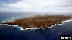 An aerial view of a remote island of Suluan, Samar, devastated by Typhoon Haiyan in central Philippines, Nov. 20, 2013. 