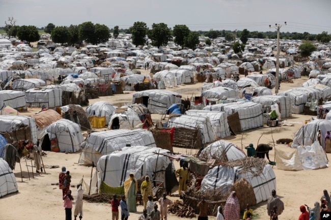 FILE - This view shows one of the biggest camps for people displaced by Islamist extremists in Maiduguri, Nigeria, Aug. 28, 2016.