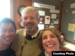 VOA reporters Roger (left) and Kelly (right) talk with history expert (center) about the Lewis and Clark Expedition.