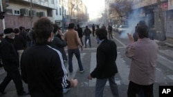 Iranian protestors attending an anti-government protest in Tehran, Iran.