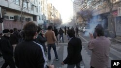 Iranian protestors attending an anti-government protest in Tehran, Iran.