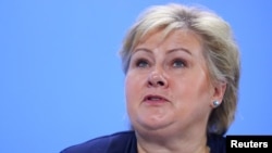 FILE - Norway’s Prime Minister Erna Solberg attends the press conference after the meeting at the Chancellery in Berlin, Germany, June 29, 2017. 