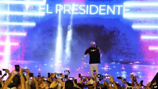 El Salvador's President Nayib Bukele participates in the closing ceremony of a congress for cryptocurrency investors in Santa Maria Mizata, El Salvador, Saturday, Nov. 20, 2021. (AP Photo/Salvador Melendez)