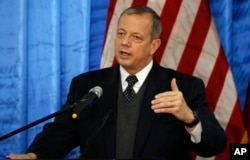 FILE - John Allen, U.S. special presidential envoy for the global coalition to counter the Islamic State group, speaks during a press conference in Baghdad, Iraq.