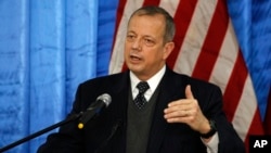 FILE - Retired Marine General John Allen, then-U.S. special presidential envoy for the global coalition to counter the Islamic State group, speaks during a press conference in Baghdad, Iraq, Jan. 14, 2015.