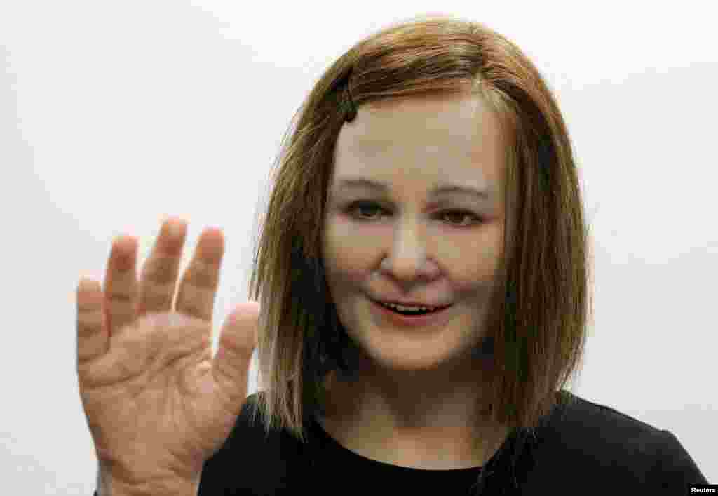 Nadine, a humanoid created by Nanyang Technological University&#39;s (NTU) Professor Nadia Thalmann and her team, reacts to the presence of people during an interview with Reuters at their campus in Singapore.&nbsp;With her brown hair, soft skin and expressive face, Nadine is a new brand of human-like robot that could one day, scientists hope, be used as a personal assistant or care provider for the elderly.