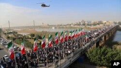 Проправительственные демонстранты вышли на улицы в поддержку правительства страны. Город Аваз. Иран. 3 января 2018 г.