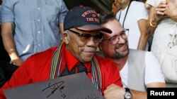 FILE PHOTO: Legendary American producer Quincy Jones, left, and Montreux Jazz Festival Director Mathieu Jaton pose during a ceremony to rename a concert hall in his name and celebrate his 85th birthday during the opening night of the 52nd Montreux Jazz Festival, June 29, 2018.