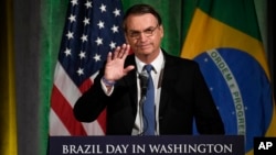 Brazilian President Jair Bolsonaro speaks at the Chamber of Commerce in Washington, March 18, 2019. 