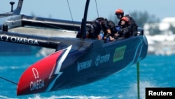 FILE - Helmsman Peter Burling drives Emirates Team New Zealand to a win over Oracle Team USA in America's Cup finals, June 25, 2017.