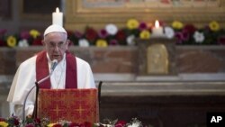 Pope Francis speaks in the Basilica of St. Bartholomew in Rome, April 22, 2017, as he celebrates the Liturgy of the Word in memory of the martyrs of the 20th and 21st centuries. 