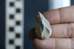 A prehistoric stone tool found at a cave in Zacatecas in central Mexico is seen in this image released on July 22, 2020.