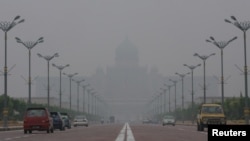 Malaysian landmark Putra Perdana in Putrajaya is seen shrouded by haze from forest fires raging across Indonesia, (File photo).