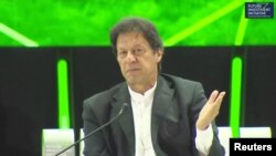 Pakistan's Prime Minister, Imran Khan speaks during a news conference at Saudi investment summit in Riyadh, Saudi Arabia, Oct. 23, 2018 in this still image taken from a video. 