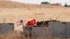 Pasukan Turki dan AS dari patroli gabungan AS-Turki di Suriah utara, tiba di Akcakale, Turki, 8 September 2019.