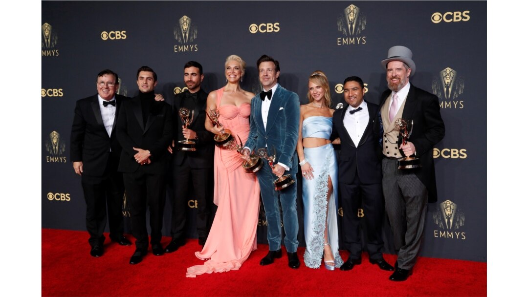 Actors Jeremy Swift, Phil Dunster, Brett Goldstein, Hannah Waddingham, Jason Sudeikis, Juno Temple, Nick Mohammed and Brendan Hunt, cast members of "Ted Lasso", pose for a picture together at the 73rd Primetime Emmy Awards in Los Angeles, U.S.