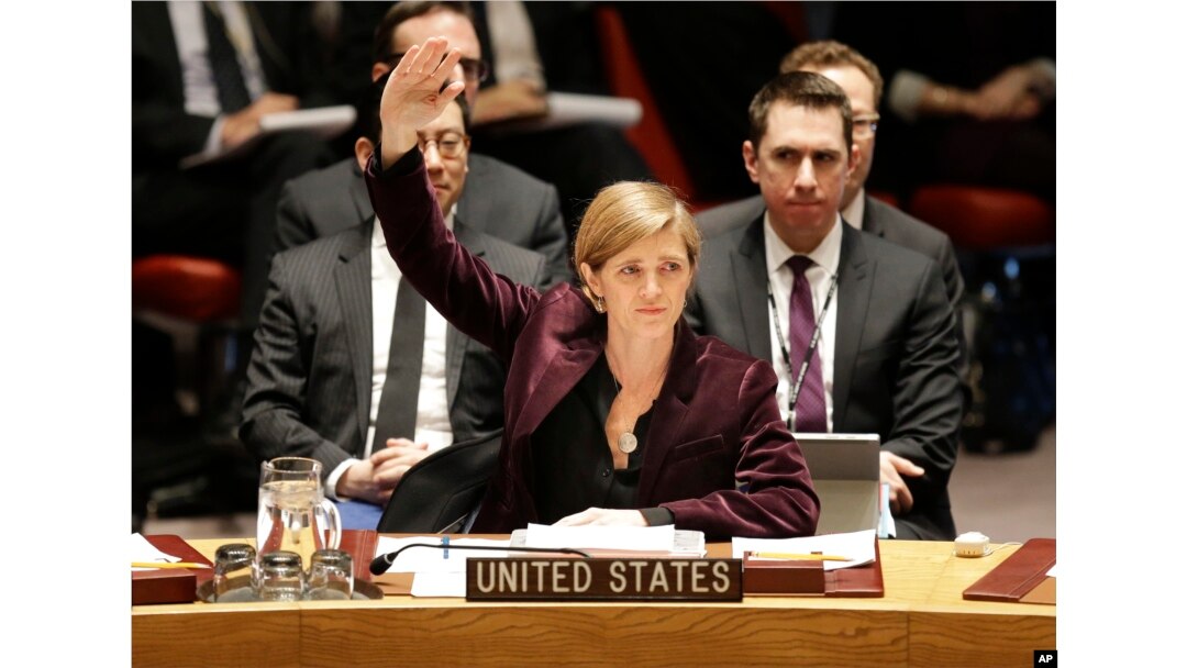 FILE - U.S. Ambassador to the United Nations Samantha Power votes on a resolution during a Security Council meeting at U.N. headquarters in New York, March 2, 2016.