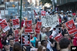 FILE - Protesters chant slogans as they march during a demonstration calling for the abolishment of Immigration and Customs Enforcement, or ICE, and demand changes in U.S. immigration policies, June 29, 2018, in New York.