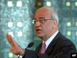 FILE - Chief Palestinian negotiator Saeb Erekat talks during a press conference in Cairo, Egypt, Oct. 2, 2011.