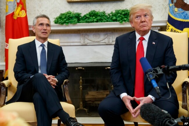 President Donald Trump meets with NATO Secretary General Jens Stoltenberg in the Oval Office of the White House, May 17, 2018, in Washington.