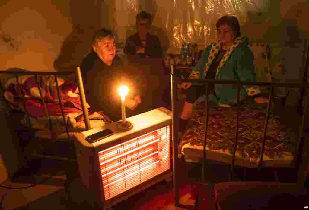 Women take refuge in a bomb shelter during a military conflict in Stepanakert, self-proclaimed Republic of Nagorno-Karabakh. Armenia accused Azerbaijan of firing missiles into the capital of the separatist territory of Nagorno-Karabakh, while Azerbaijan said several of its towns and its second-largest city were attacked.