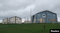 FILE - Boarded up windows are seen on the Chippewa Indians Turtle Mountain Reservation in Belcourt, North Dakota, U.S., May 11, 2016.