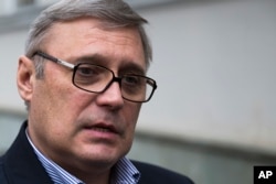 FILE - Opposition leader and former Russian Prime Minister Mikhail Kasyanov speaks to the media in Moscow, Feb . 28, 2015.