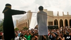 A public caning in Aceh (AP)