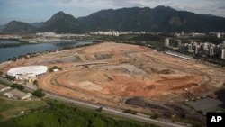 FILE - Olympic Park, that will host competitions for 10 sports at Rio's Olympics in 2016, is under construction in the area previously occupied by the Jacarepagua Autodrome in Rio de Janeiro, Brazil. 