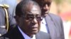 Zimbabwe President Fires VP, Ministers