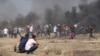 Clouded by Smoke and Tear Gas, a View from Deadly Gaza Protests